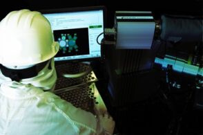 Engineer working on an RGA utilizing INFICON software Engineer working on an RGA utilizing INFICON software