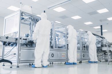 Operators working on different tools in a wafer fab fabworkers