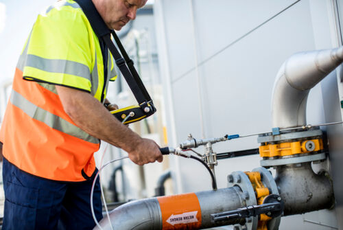 locating leaks on a gas pipe with help of IRwin methane leak detector locating leaks on a gas pipe with help of IRwin methane leak detector