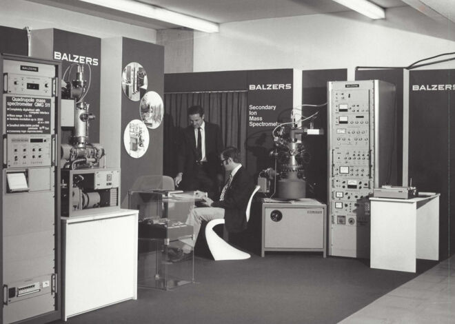 Remo Vogelsang and his colleague at an exhibition in Edinburgh, ©John Cameron Balzers-Mass-Spectrometer-QMG511